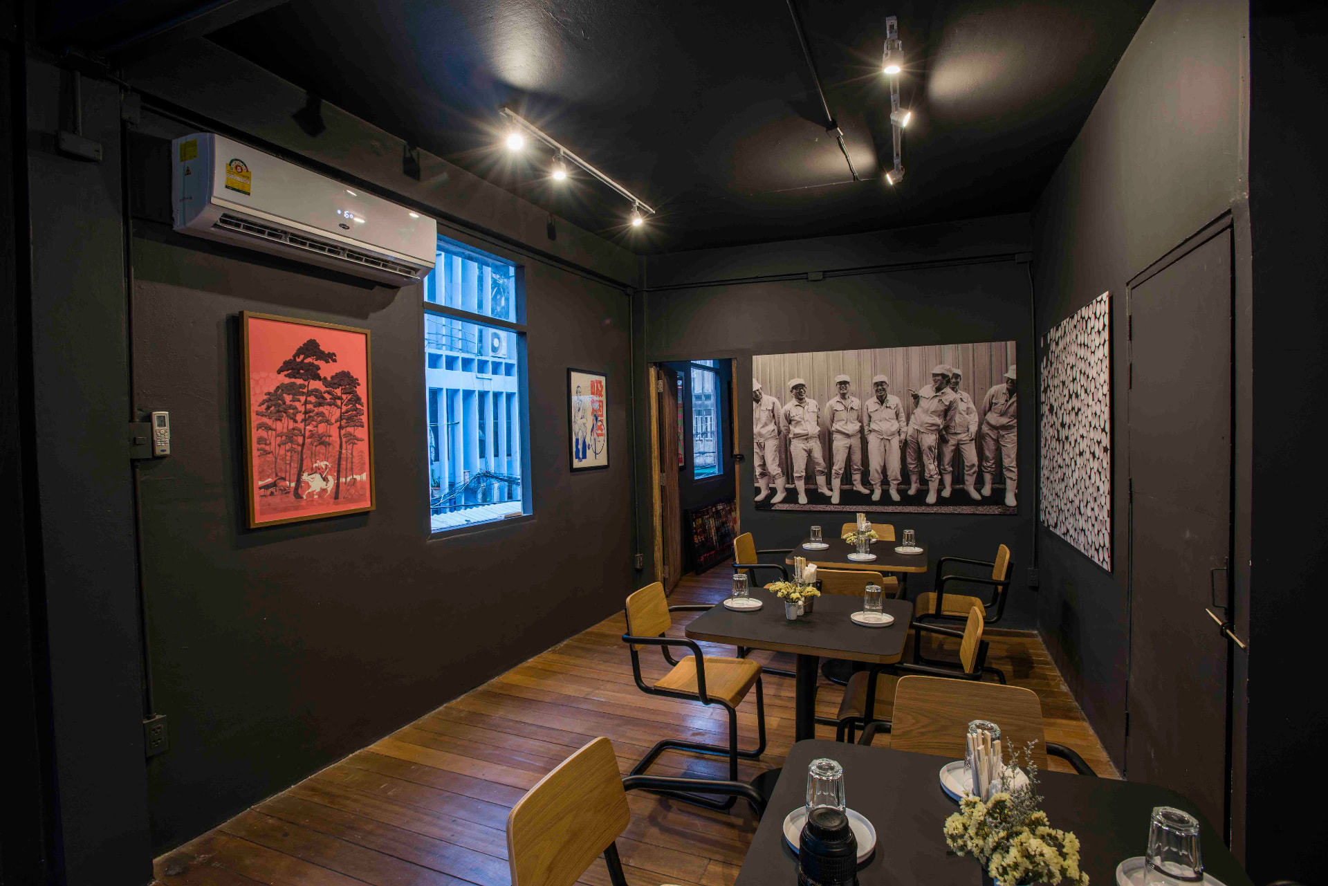 JUA dining room with tables set for a group