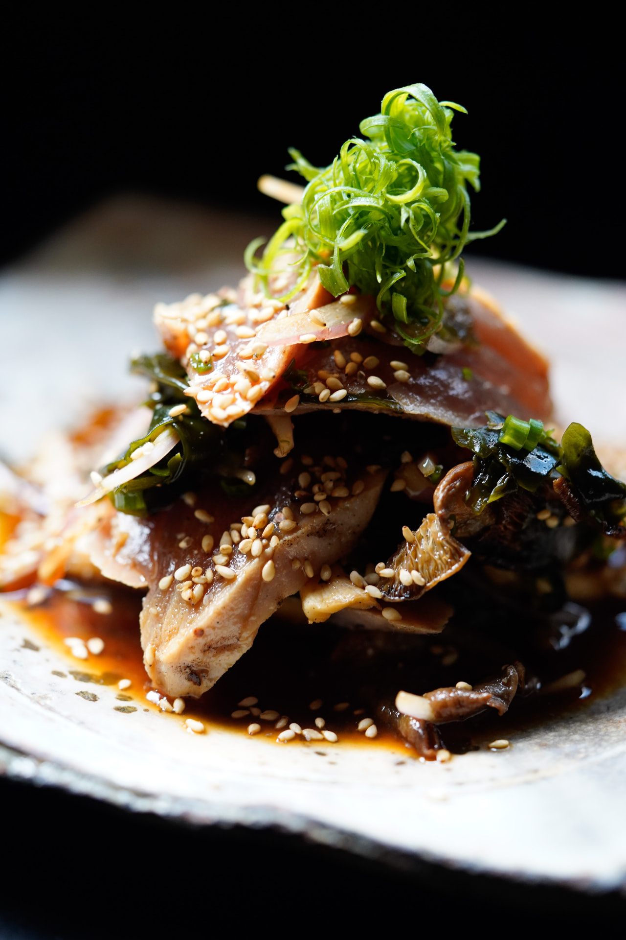 Seared ahi tuna tataki with wakame, sesame and spring onion