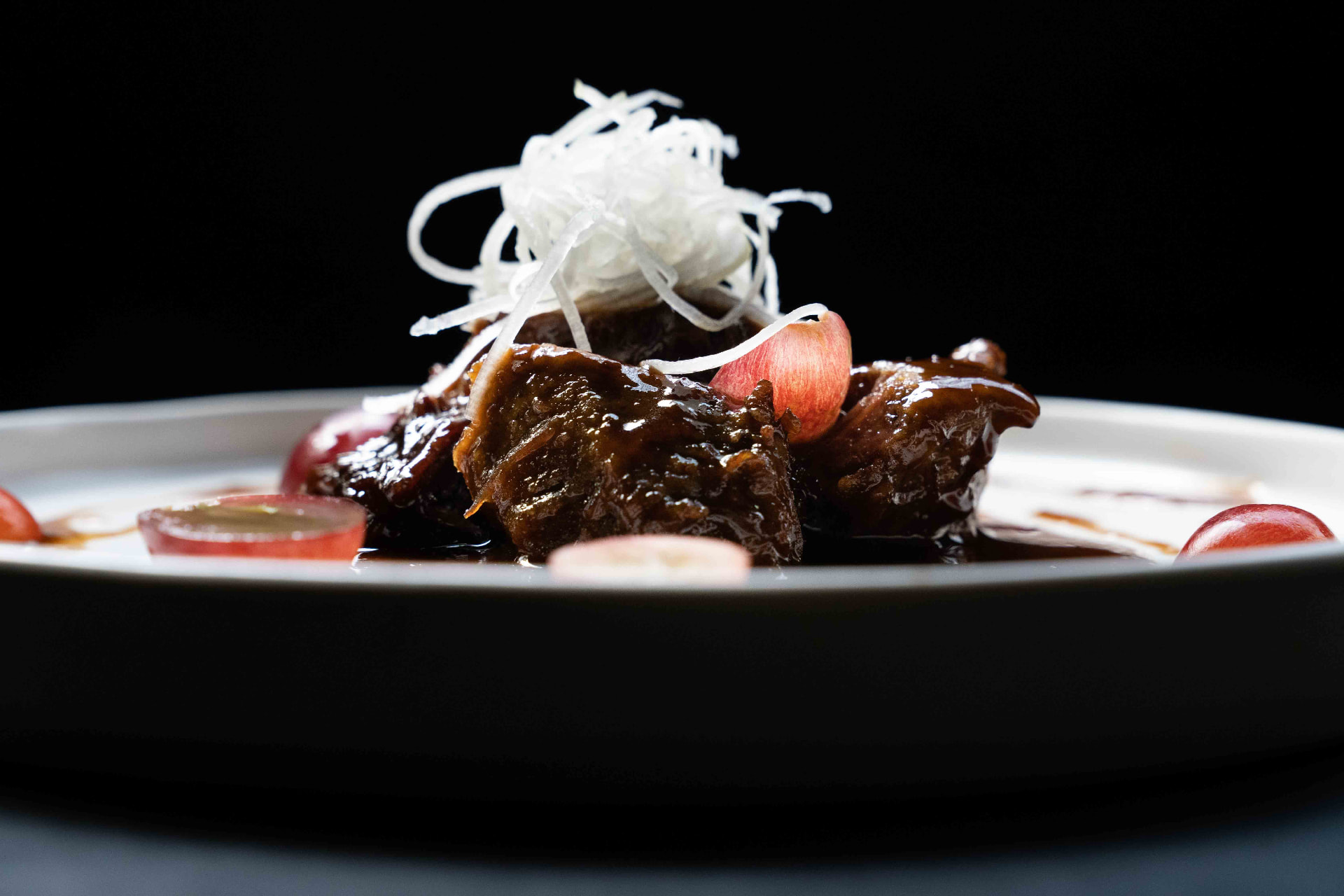 Glazed wagyu beef cheek topped with shredded negi